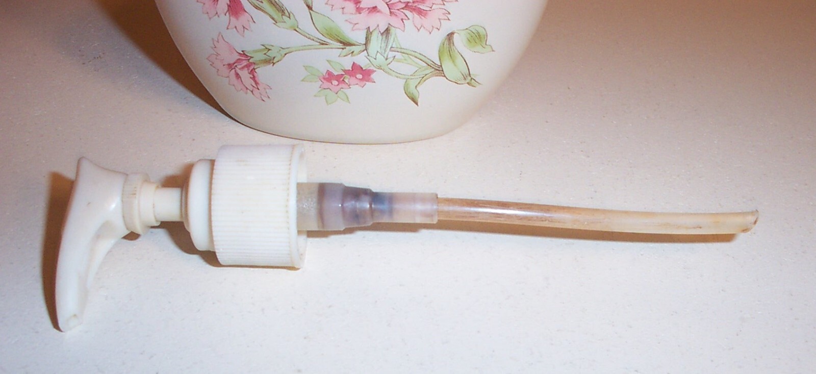 VINTAGE AVON LOTION DISPENSER TAN w PINK FLOWERS eBay