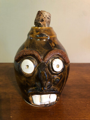 Vintage face jug with handle. Well done
