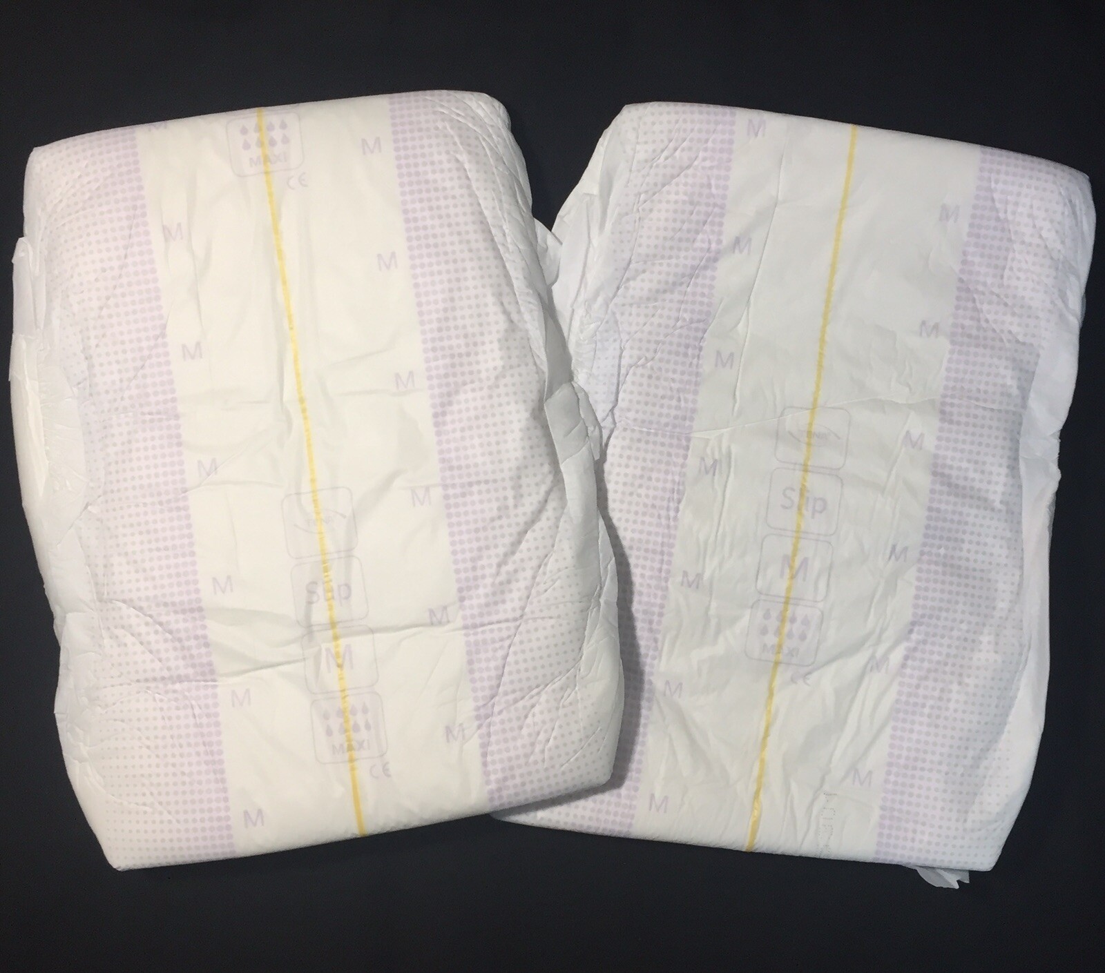 Pañales/cartas Tena Slip Active Fit Maxi medianas con respaldo de plástico para adultos paquete de 2 muestras