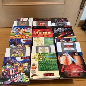 Excellent condition Virtual Boy console + 6 games + AC adapter set.Tested