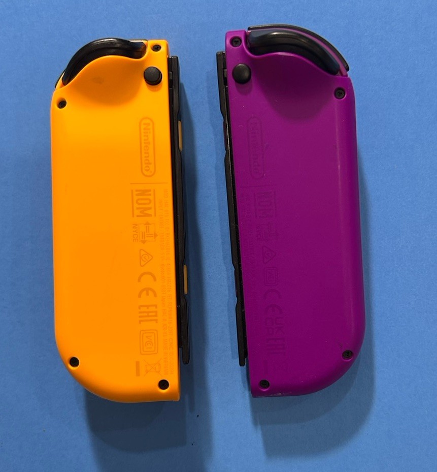 Nintendo Switch Joy-Con Controllers Purple Left & Orange Right OEM