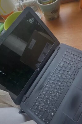 Black HP laptop (only Comes With One Part Of The Charger )