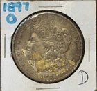 1897-O Morgan Silver Dollar - discolored on obverse - circulated condition