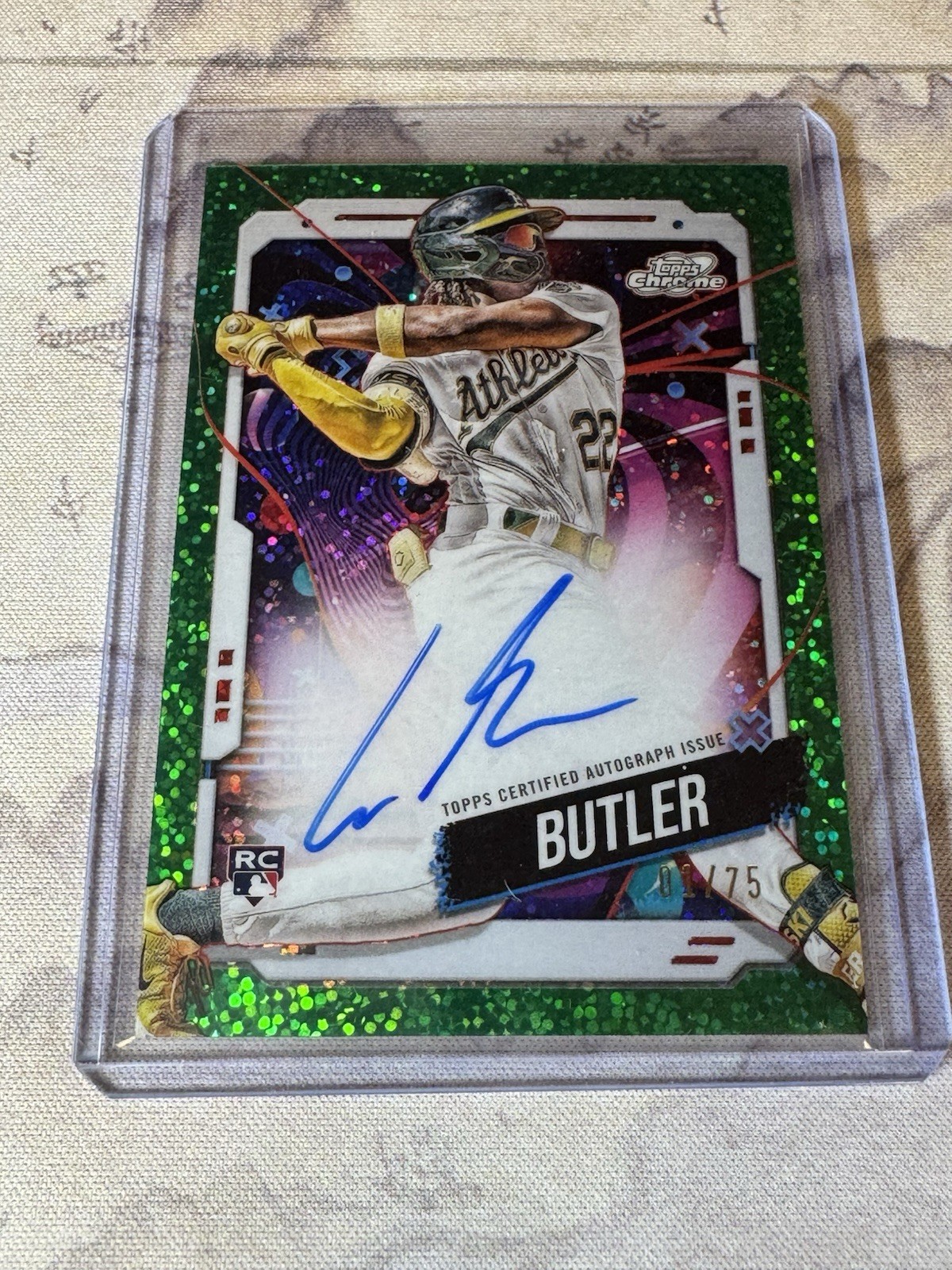 2024 Topps Cosmic Chrome - Autographs Lawrence Butler Green Space Dust /75