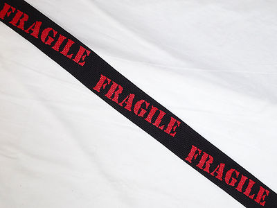 LM Fragile black nylon guitar STRAP red lettering with leather ends NEW