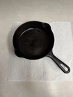Griswold #4 702 C Cast Iron Skillet with Small Block Logo and Groove Handle