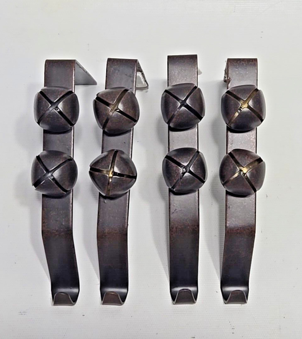 4 RUSTIC BROWN JINGLE BELL METAL STOCKING HOLDERS HOBBY LOBBY SLEIGH