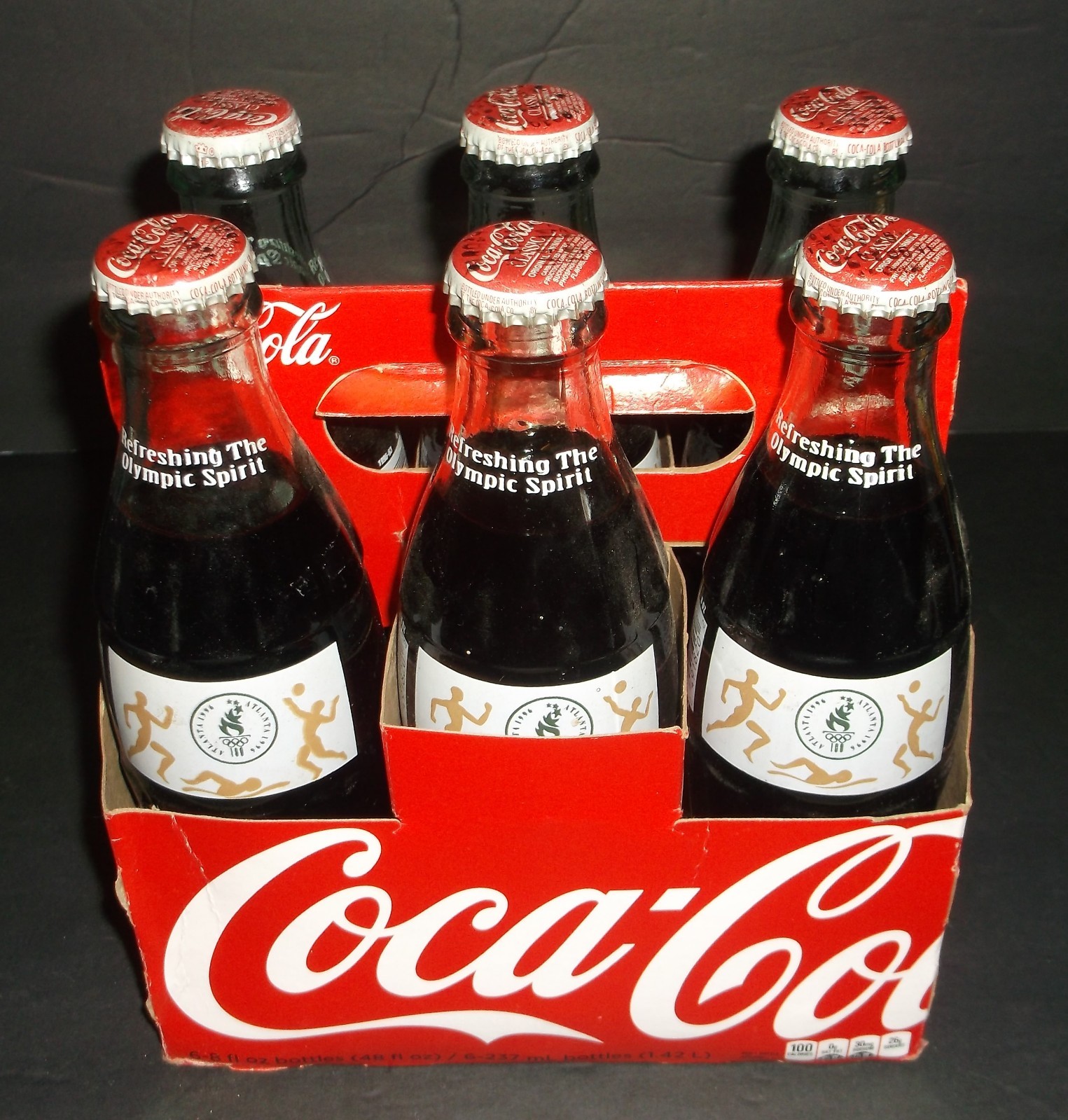ATLANTA 1996 OLYMPICS COCACOLA BOTTLE 6 PACK 8 OZ GLASS BOTTLES FULL