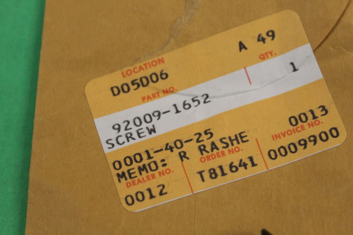 NOS KAWASAKI 92009-1652 COWLING SCREW 5X12 BLACK EX500 EX250