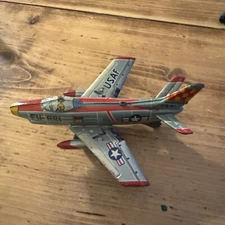 Japan Friction Power USAF FU-881 Airplane Tin Toy