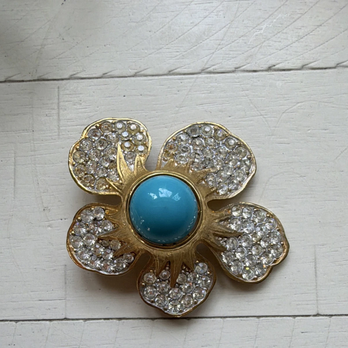 Vintage Capri Gold Tone Flower Brooch Pin Blue Glass Center