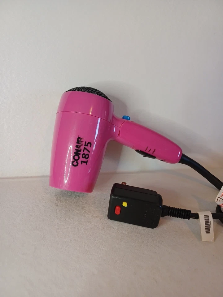 Secador de pelo plegable vintage rosa Conair 1875. Excelente estado. Foto 3 de 4
