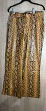AKIRA snake print faux leather pants