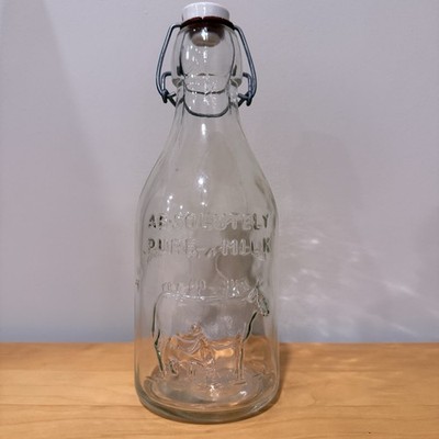 George Bacon Dairy Glass Milk Bottle Quart Embossed Cow Milk Maid Swing Top
