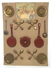 ANTIQUE SET OF TIN METAL CHILDREN'S DISHES, FLATWARE AND POTS ON ORIGINAL CARD