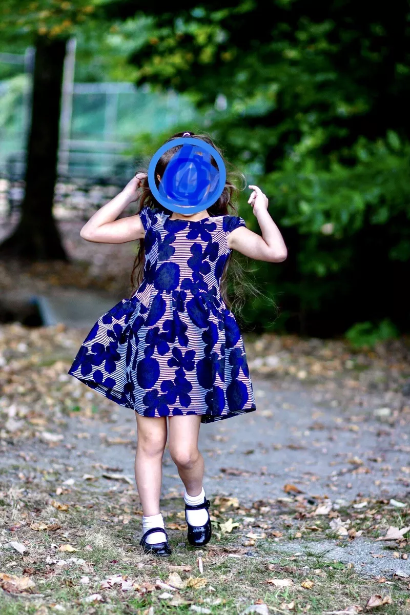 Little girl in blue dress sales