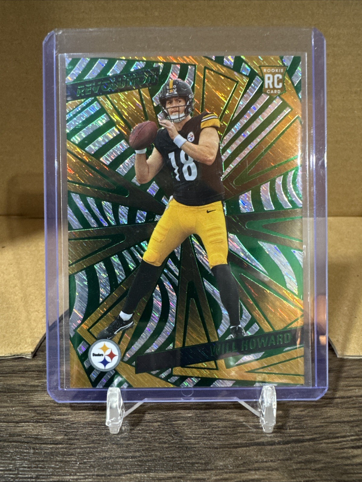2025 Panini Revolution - Rookies Will Howard #248 Green Storm /699 (RC)
