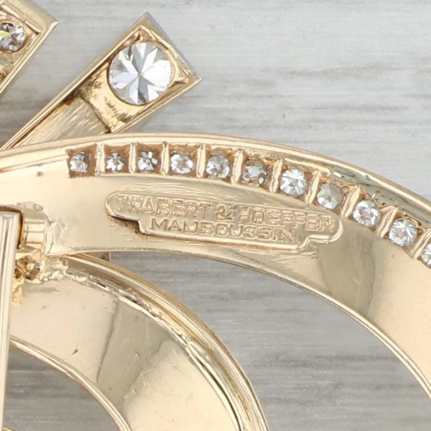 Broche clip piel reflectante Trabert Hoeffer Mouboussin zafiro diamante oro 14k Foto 3 de 4