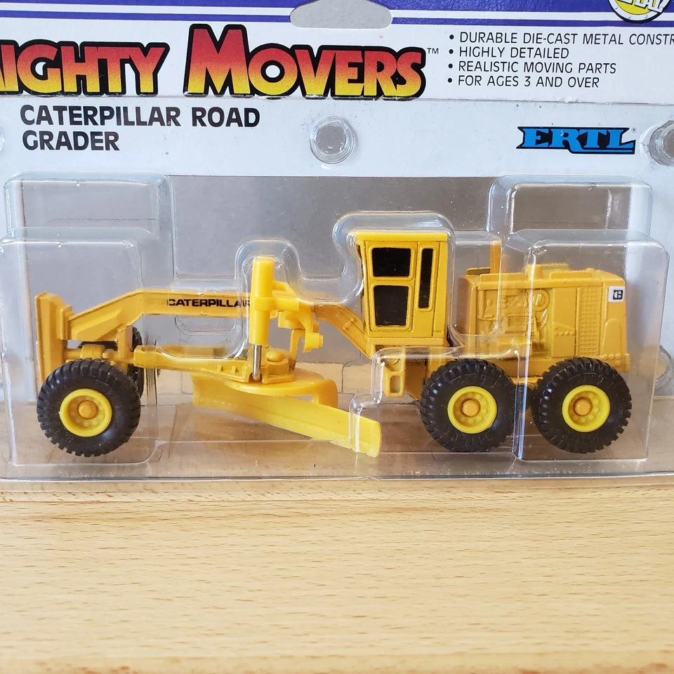Niveladora de carretera Ertl CAT Caterpillar Mighty Movers diecast Foto 3 de 4