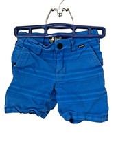 Hurley blue shorts Size 4T front and back pockets. Zipper and button closure.