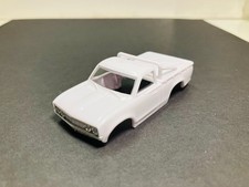 AUTO-WORLD Datsun PICK UP body - unpainted  CHROME BUMPERS for AFX, AURORA