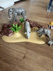 PLAYMOBIL Elephant Family Safari Watering Hole w/ Explorer & Rocky Terrain Base — photo 4
