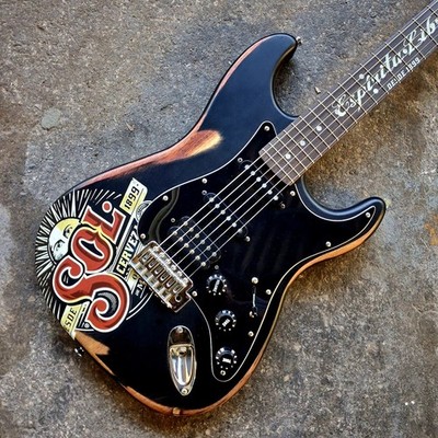Squier by Fender Stratocaster Made in Mexico Sol Beer Gitarre SSH