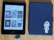 Amazon Kindle Voyage. Great screen, finicky USB port. Books Cover bundle