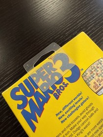 1990 NINTENDO SUPER MARIO BROS. 3 SIGILLATO IN FABBRICA NES SIGILLO OVALE NUOVO MENTA *LEGGI*