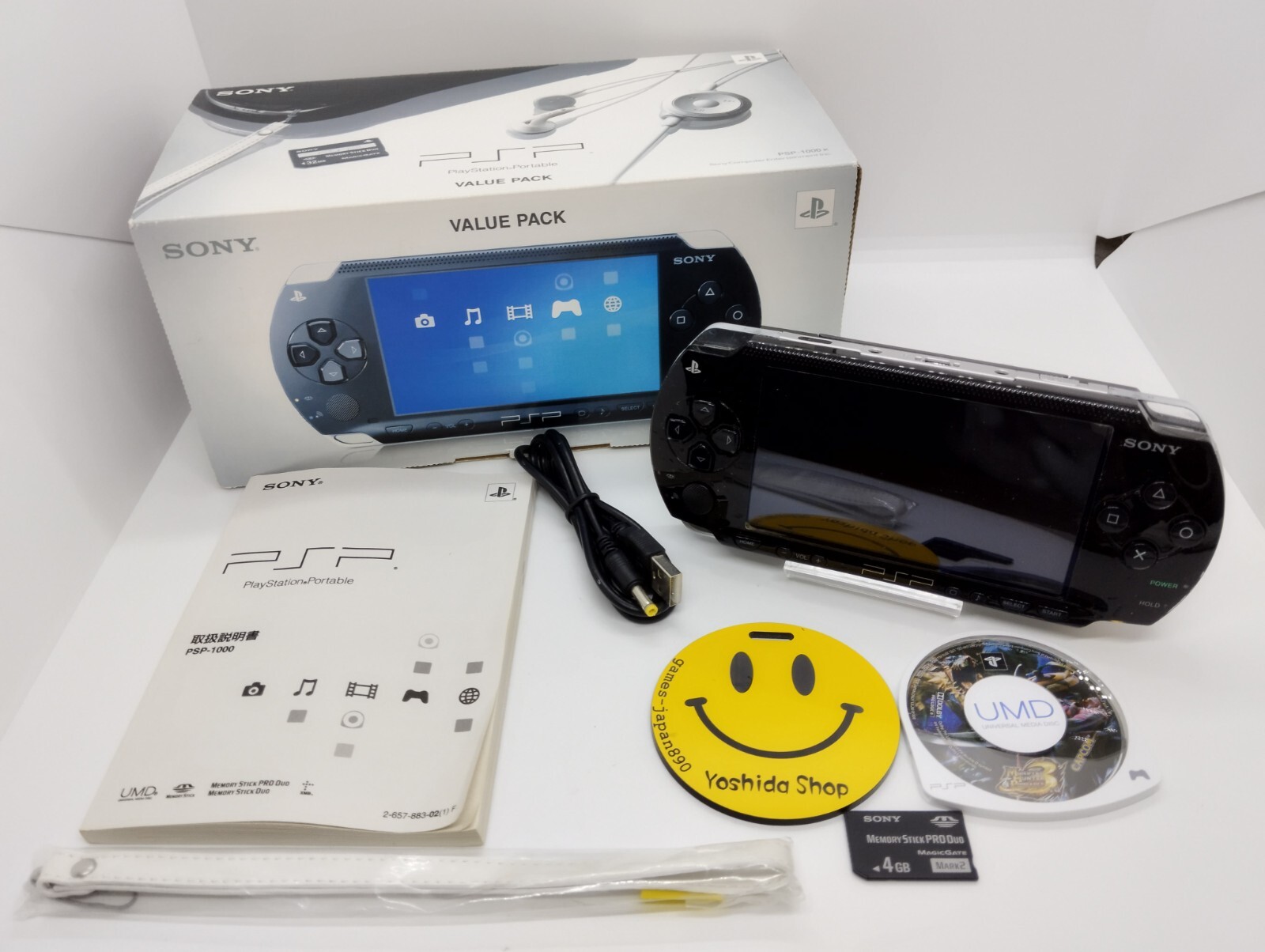 Piano Black Sony PSP 1000 Handheld Gaming Console with Original Box, Charger, and Region-Free Playstation Compatibility