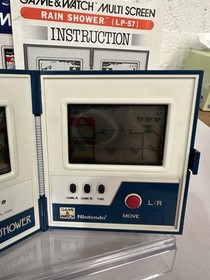 VINTAGE GAME & WATCH NINTENDO G&W RAIN SHOWER MANUAL + NEW BOX WORKING LP-57