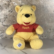DISNEY WINNIE THE POOH BEAR RATTLE LOVEY PLUSH ANIMAL CIRCA 2008
