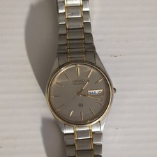 Seiko SQ Quartz Day/Date Analog Silver Dial T...