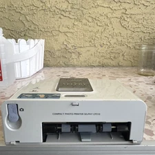 Canon Selphy CA-CP200 Compact 4X6 Postcard Photo Printer. 