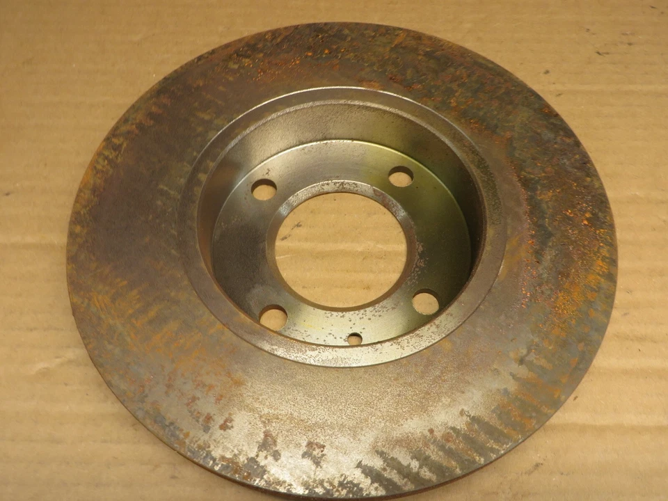 VW AUDI 2 ROTORES DE FRENO DELANTEROS #141095# 3450 NOS SIN USAR 2 PIEZAS 1 con óxido 1 limpio Foto 2 de 4