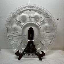 Reversible deviled egg dish     Clear     14"     holds 8 eggs