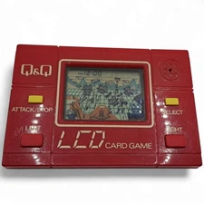 Vintage Q&Q Flying Saucer Red LCD Handheld Game