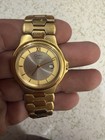Caravelle by Bulova Quartz Gold Tone Bracelet Watch Silver Dial Date Roman — photo 2