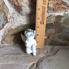 Angel Figurine Sitting Baby Cherub Ceramic w Flower Crown 2.5” Tall Blow Kisses