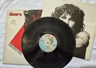THE DOORS GREATEST HITS UK vinyl LP .1980 1st Press A1/B1 "red" vinyl. butterfly
