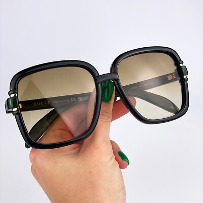 Gucci Women\'s Sunglasses - Black and Green Gradient Amazon.com: Gucci Square Sunglasses for womens GG0036SN 002  main image 3