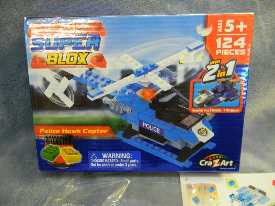 SUPER BLOX POLICÍA HALCÓN HELICÓPTERO Y MINIFIGURA KIT DE 124 PIEZAS POR CRA-Z-ART-SIN USAR, EN CAJA Foto 2 de 4