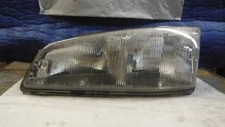 92 93 94 95 GRAND AM L. HEADLIGHT 11907