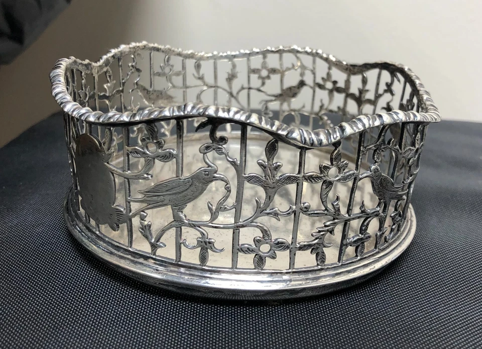 Antigua botella de vino de plata de ley con pájaros Foto 2 de 4