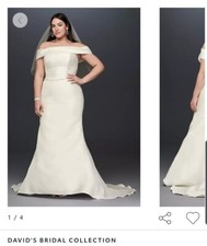 Never worn  Davids bridal, size 14 wedding dress for sale. In original dress bag