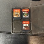 3X Nintendo Switch games - Breath of The Wild, Splatoon 2, DOOM.