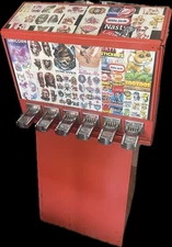Tattoo Sticker Machine with 6, 50 cent coin mechs that can adjust to $1.25.