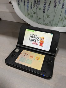 Nintendo 3DS XL Blue/Black with charger, SD card 8 games, tested works good.