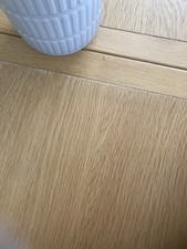 Oak Round Dining Table With Dark Grey  Base Extends To Oval. 43" Dia. Minor Flaw