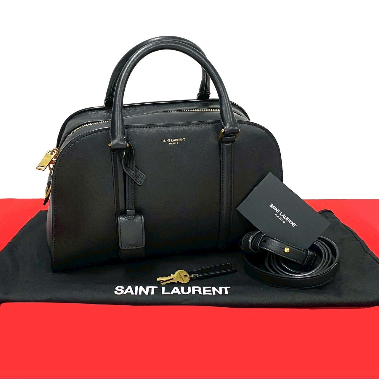 Borsa a tracolla YVES SAINT LAURENT con logo Duffle Lock in pelle nera 77226